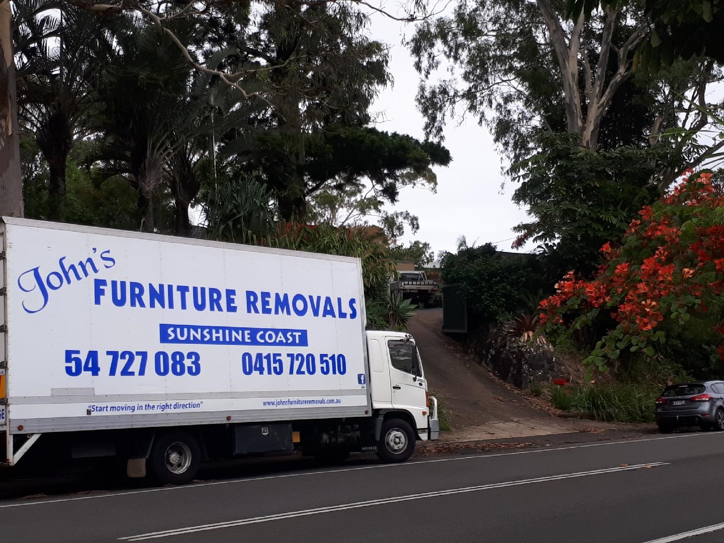 johns removals truck on-the-road